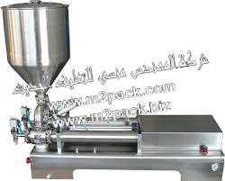 ماكينة تعبئة ذبدة الفول السوداني وزيت الفول السوداني التي تعمل بضغط الهواء موديل 404 إم تو باك - ماركة المهندس منسى