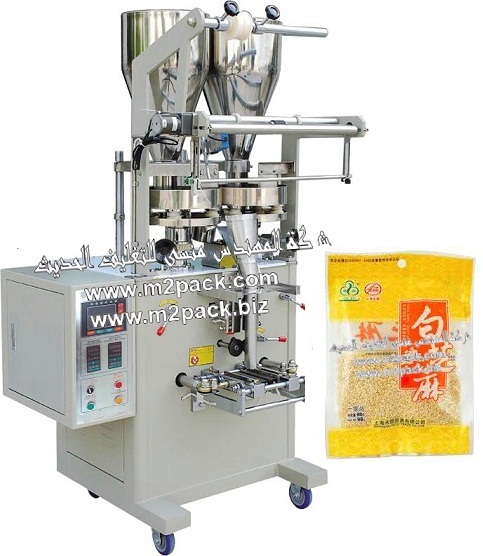 ماكينة تعبئة وتغليف السمسمية فلو منسي باك الاتوماتيكية ذات سير ناقل بها اطباق