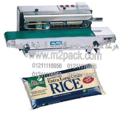 ماكينة لحام وتصنيع أكياس الارز الابيض بسير ناقل اتوماتيكية موديل 301 ام تو باك ماركة المهندس منسي المقدمه لكم من شركة ام تو باك لماكينات التعبئة والتغليف الحديثة