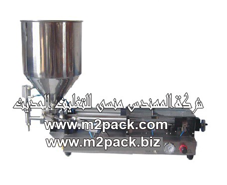 ماكينة تعبئة المواد اللزجة نصف اتوماتيك والتي تعمل بضغط الهواء موديل إم تو باك 404 ماركة المهندس منسي التي تم تصنيعها في مصانع المهندس منسي لماكينات التعبئة والتغليف والمواد الخام الخاصة بعملية التعبئة والتغليف