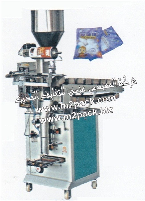 ماكينة تعبئة وتغليف الحبوب الاتوماتيكية ذات سير متحرك به اطباق التعبئة ذات الشكل العمودي